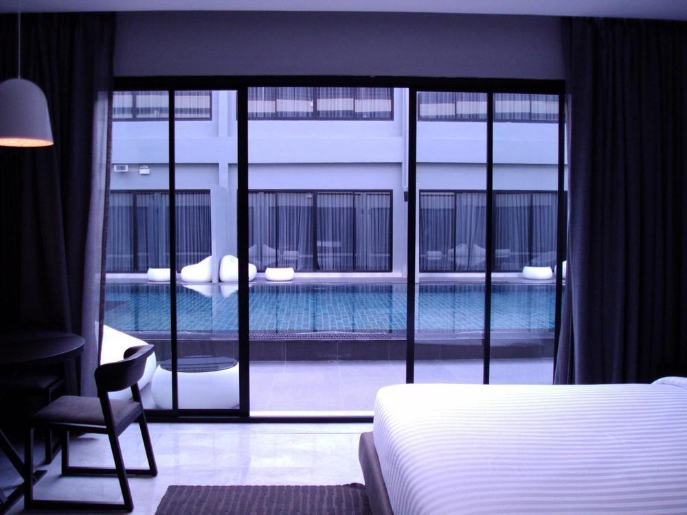 S Ratchada Leisure Hotel - Sha Plus Banguecoque Exterior foto A room at the hotel